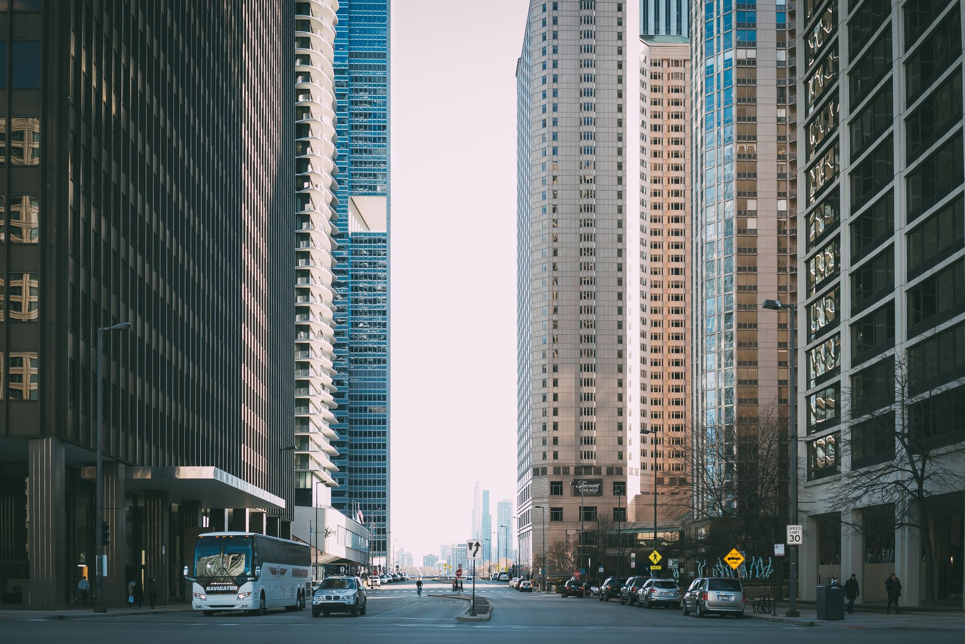 Vibrant city street scene with tall skyscrapers and city life full of cars and pedestrians. — Ultralight No Pull Harness with